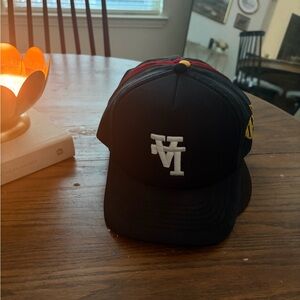 Black Trucker Hat with White Logo